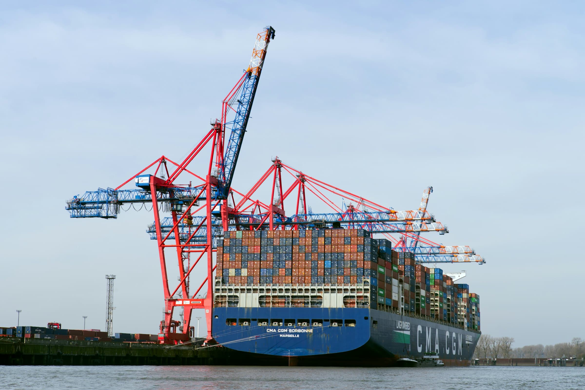 A container ship being loaded at a port terminal
